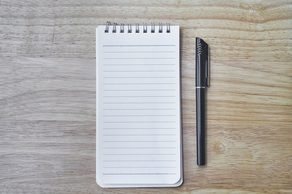notebook, pen, the work